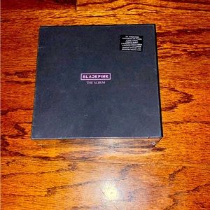 New never opened. Includes CD, Hardcover photo book (96 pages